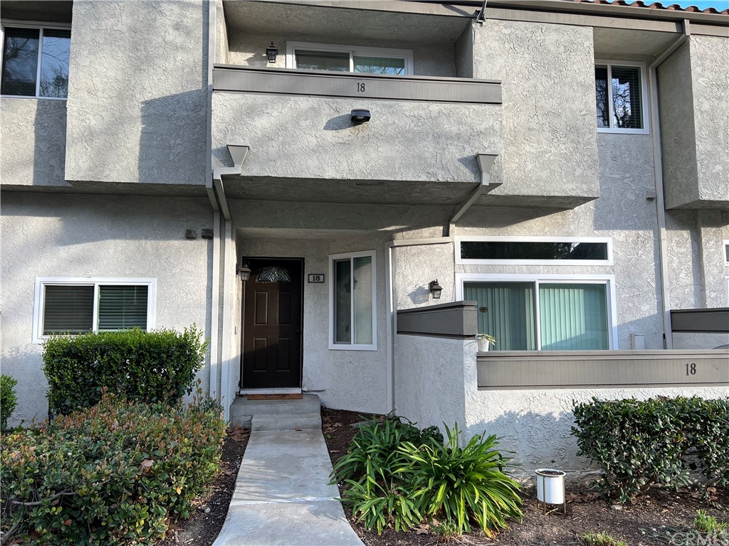 18 Willowcrest Lane Phillips Ranch, CA 91766 - Photo 1 of 1 a view of a building with potted plants