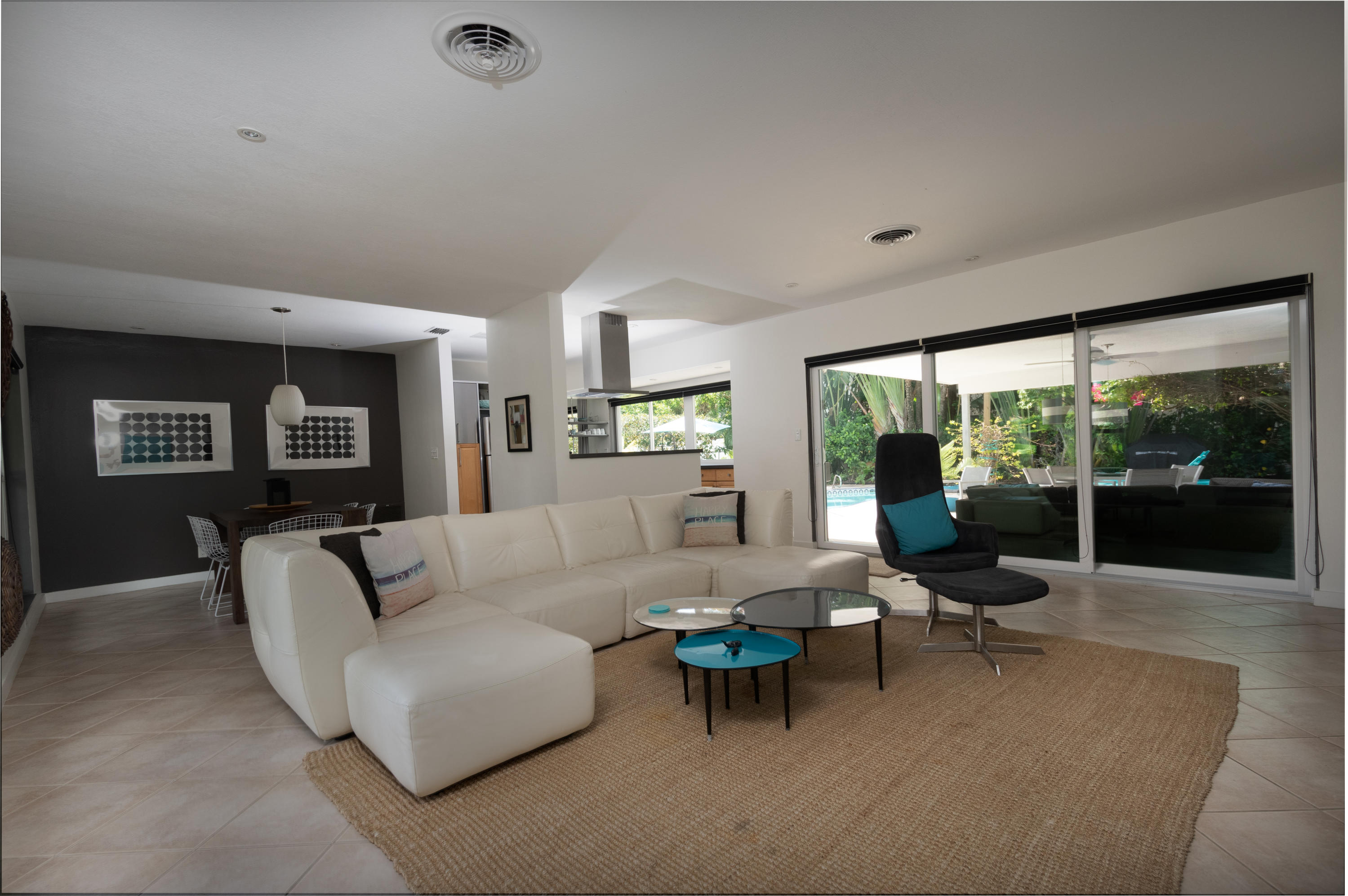 800 Northeast Bay Cove Street Boca Raton, FL 33487 - Photo 3 of 26 Living Room to Patio
