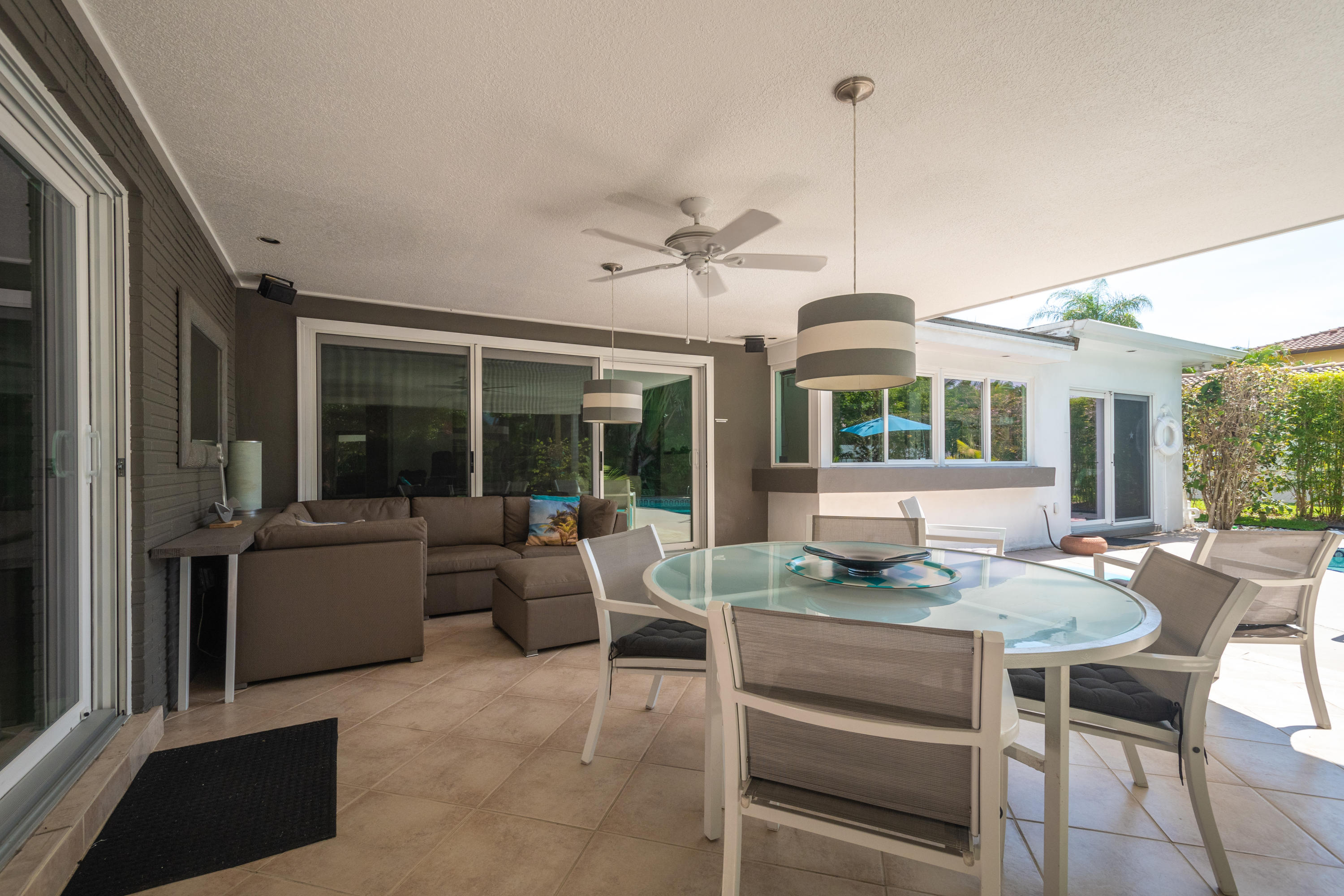 800 Northeast Bay Cove Street Boca Raton, FL 33487 - Photo 7 of 26 Patio to Living Room