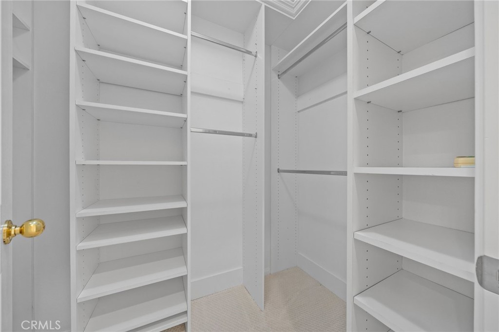 3 Wildflower Place Ladera Ranch, CA 92694 - Photo 28 of 32 a view of walk in closet with empty racks