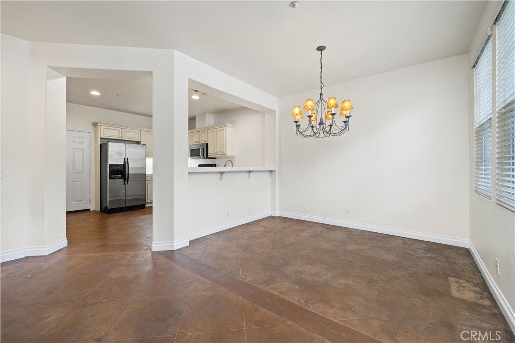3 Wildflower Place Ladera Ranch, CA 92694 - Photo 3 of 32 a view of an empty room with window and cabinet