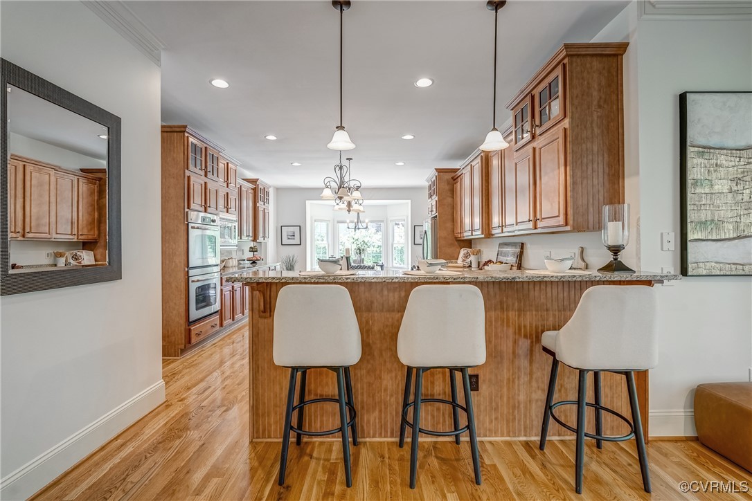 3330 Handley Road Midlothian, VA 23113 - Photo 22 of 49 High-top bar seating at the island creates a seaml