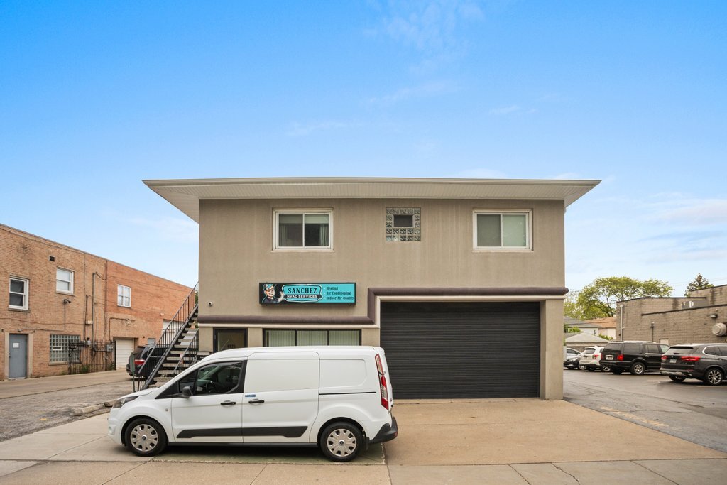 a car parked in front of a house