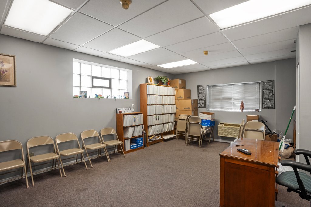 4425 Harlem Avenue Berwyn, IL 60402 - Photo 20 of 31 a living room with furniture a air conditioner vent and a window