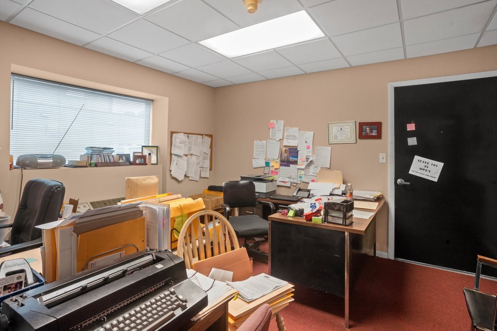 4425 Harlem Avenue Berwyn, IL 60402 - Photo 23 of 31 a room with furniture a flat screen tv and a window