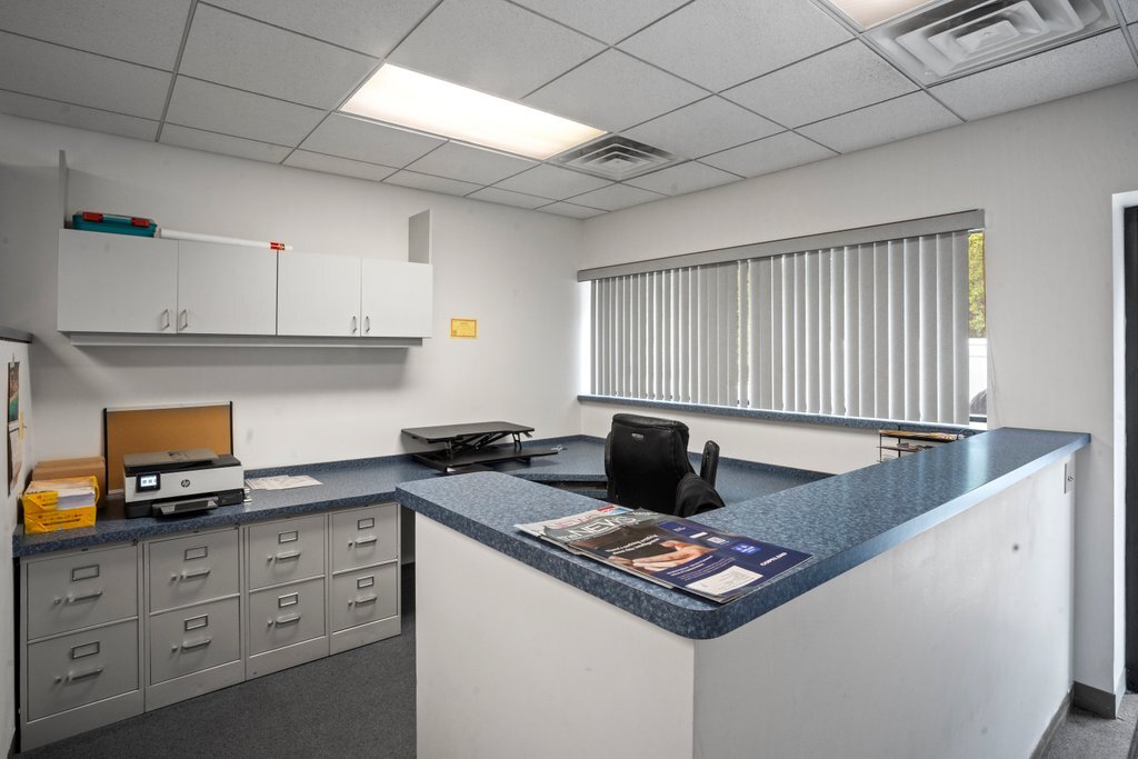 4425 Harlem Avenue Berwyn, IL 60402 - Photo 5 of 31 a kitchen with sink stove and cabinets