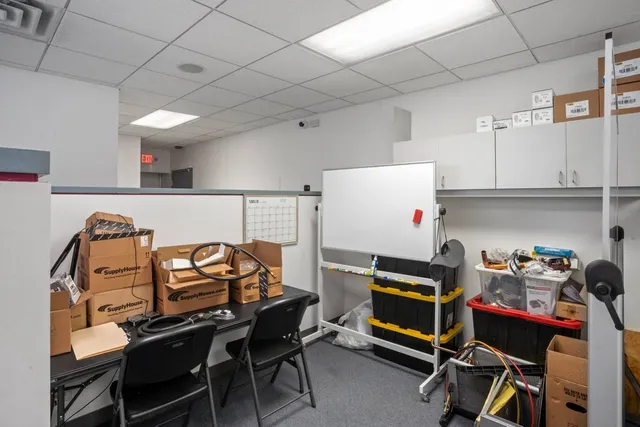 a workspace with furniture and window