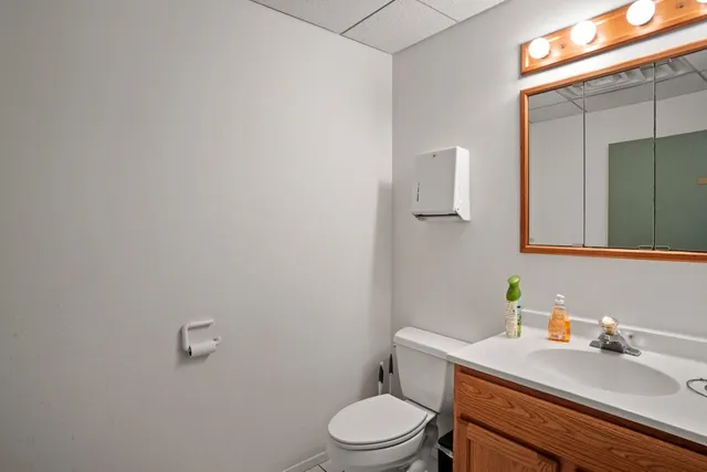 a kitchen with stainless steel appliances a refrigerator and a stove top oven