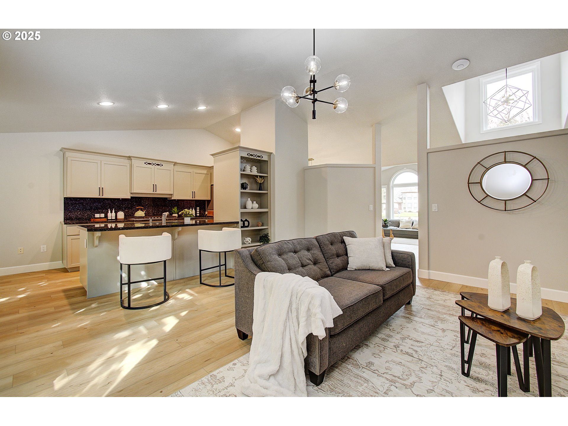 2513 Northwest 147th Street Vancouver, WA 98685 - Photo 11 of 42 a living room with furniture and kitchen view
