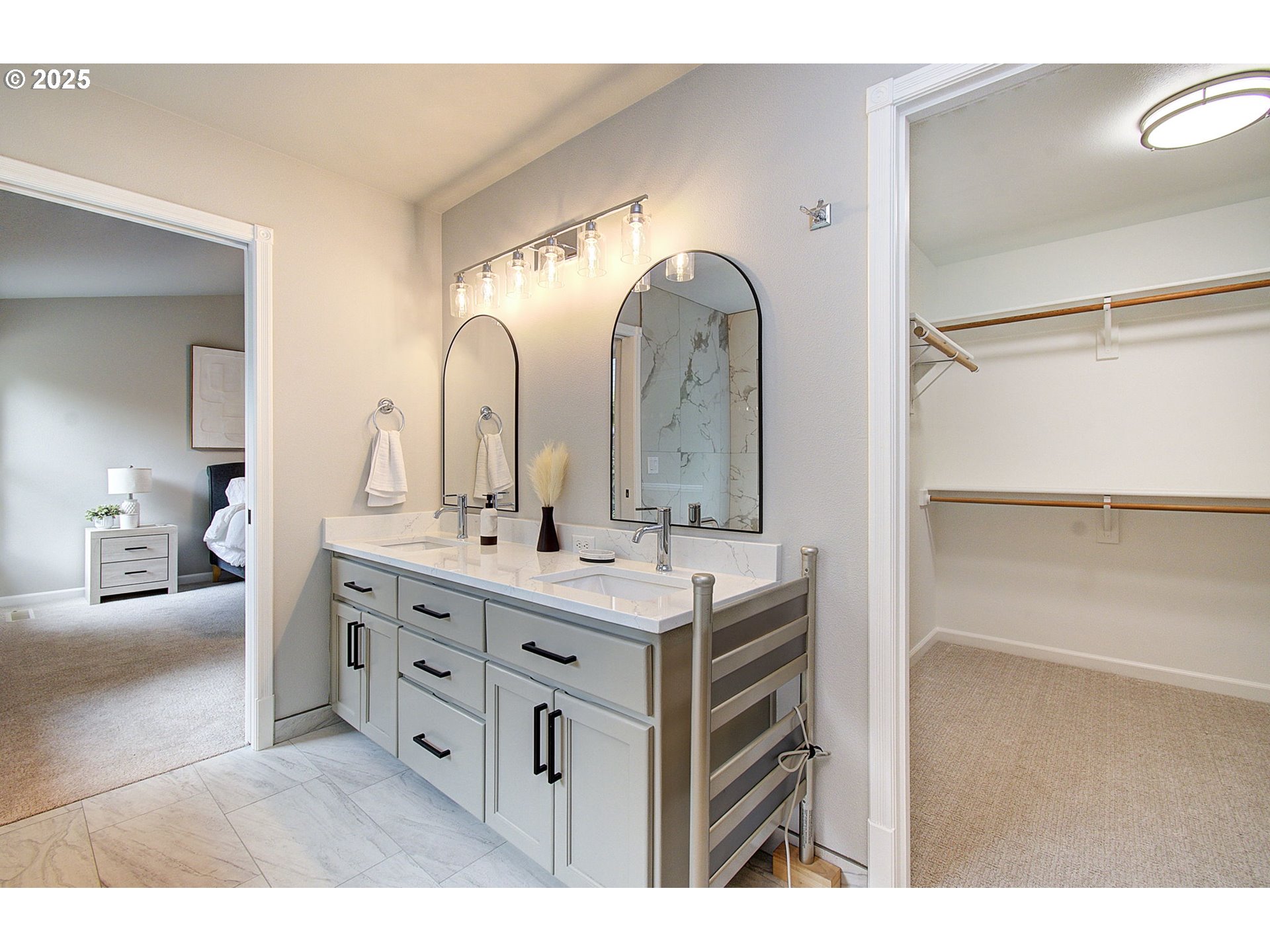 2513 Northwest 147th Street Vancouver, WA 98685 - Photo 30 of 42 a bathroom with a double vanity sink mirror and shower