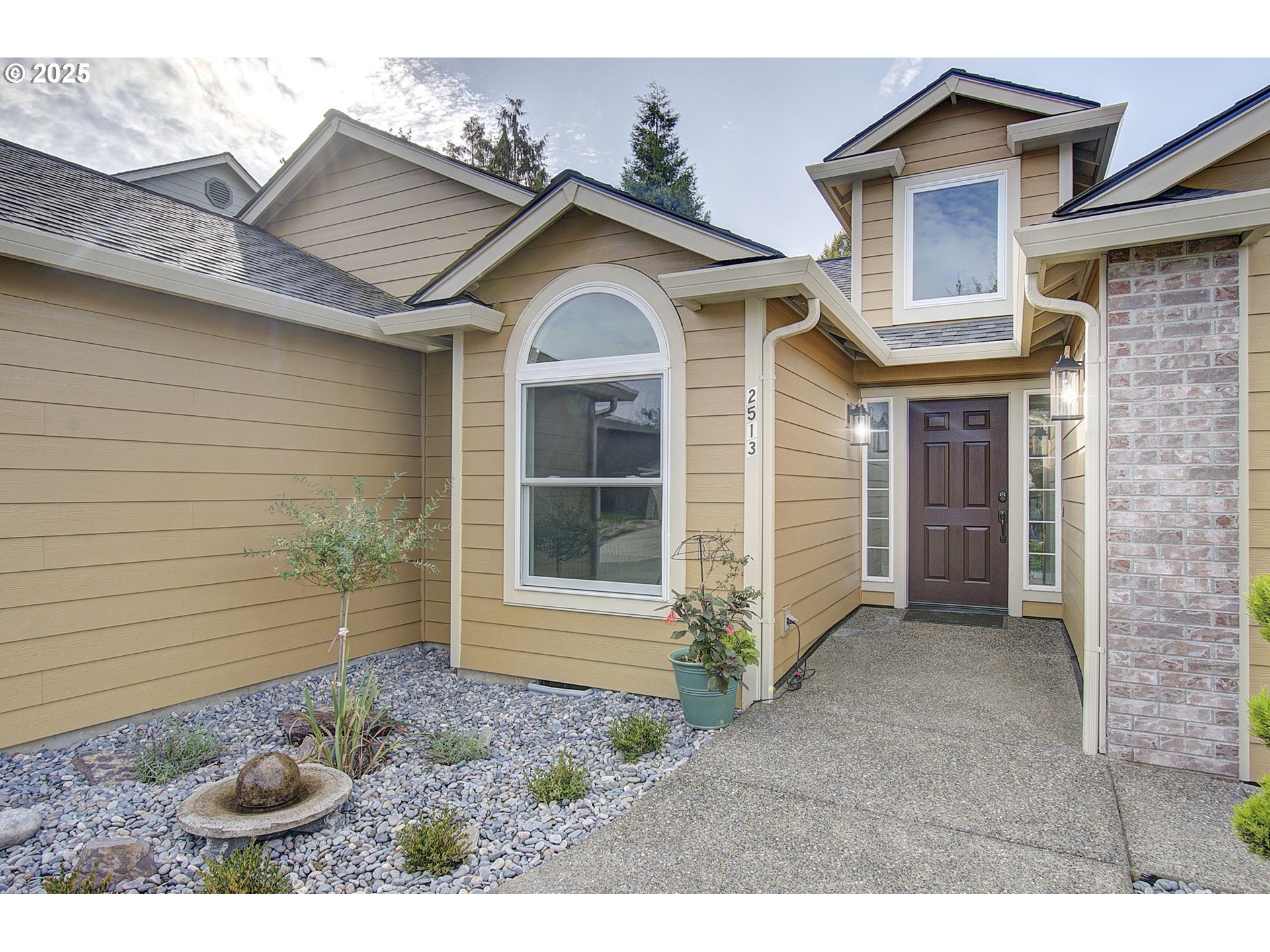 2513 Northwest 147th Street Vancouver, WA 98685 - Photo 3 of 42 a view of a house with a yard