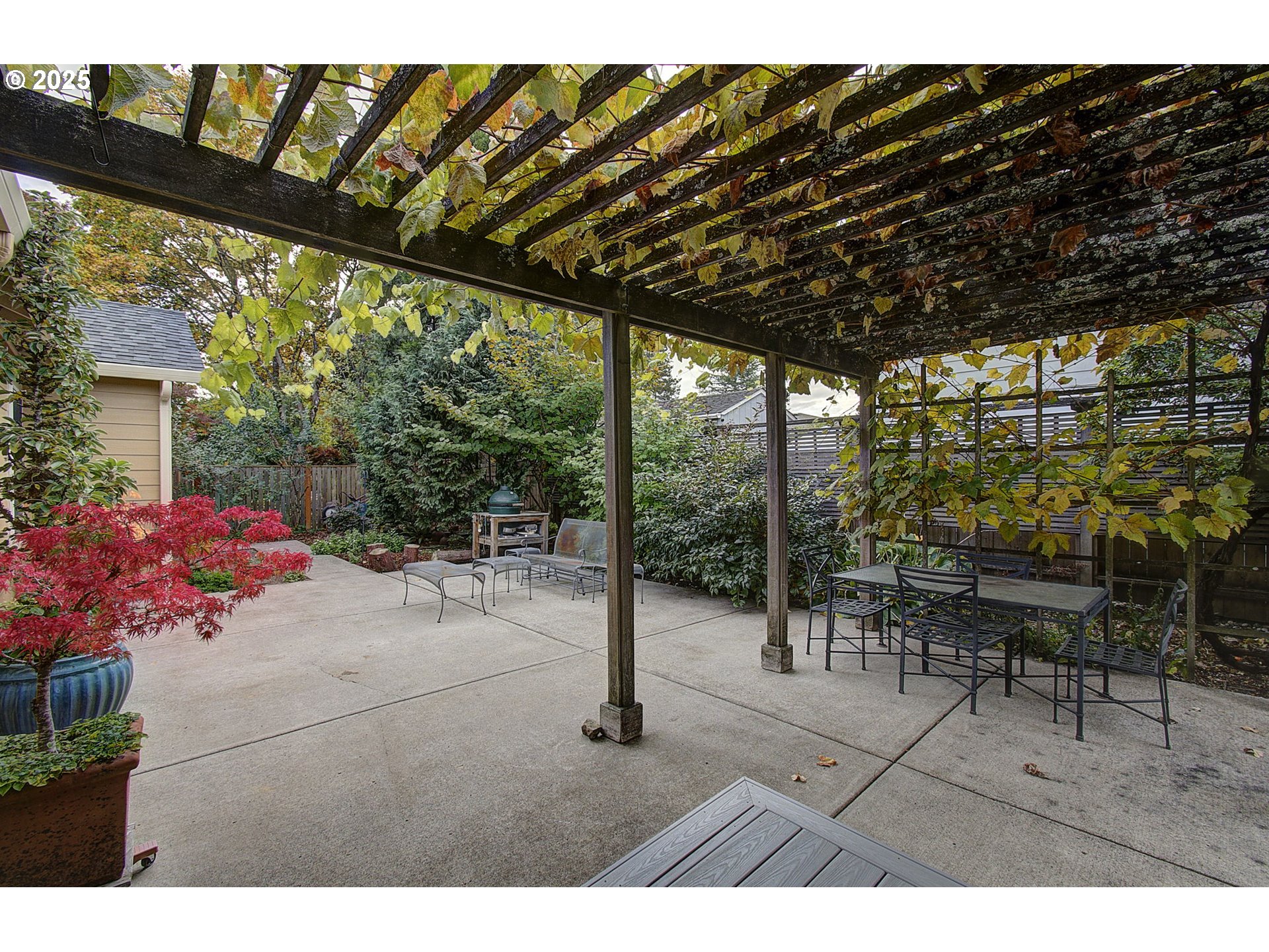 2513 Northwest 147th Street Vancouver, WA 98685 - Photo 37 of 42 a backyard of a house with table and chairs