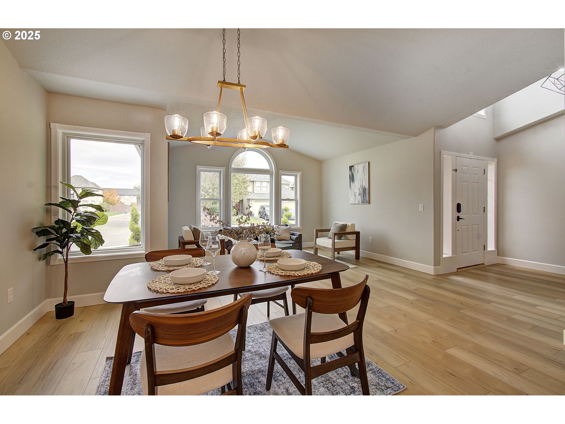 2513 Northwest 147th Street Vancouver, WA 98685 - Photo 7 of 42 a view of a dining room with furniture and wooden floor