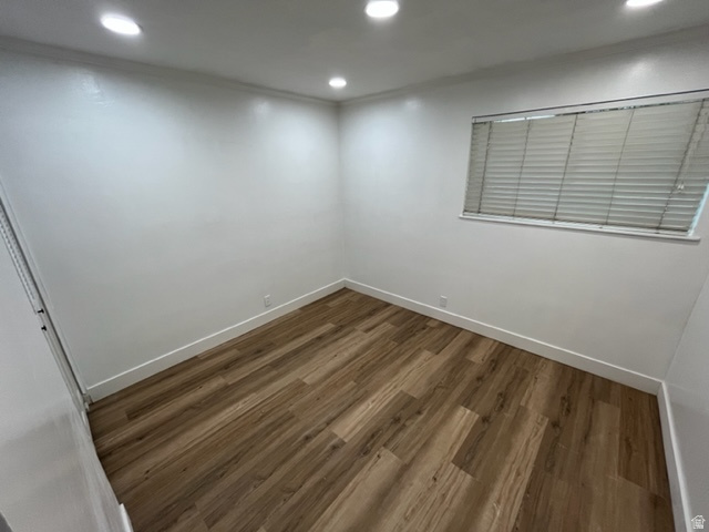 6884 670 East Midvale, UT 84047 - Photo 17 of 28 Unfurnished room featuring dark wood-style floors and recessed lighting