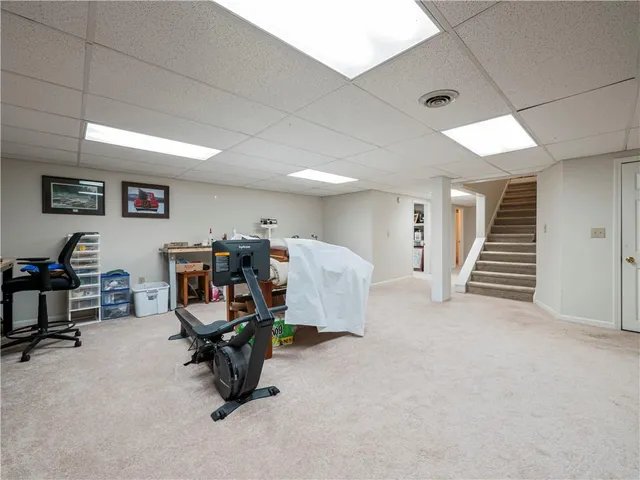 a view of a workspace with furniture