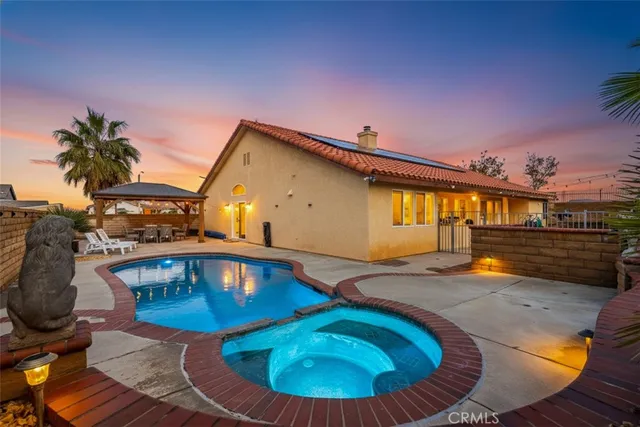 a view of a house with swimming pool