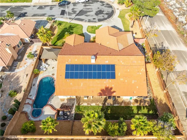 a view of a swimming pool with a patio