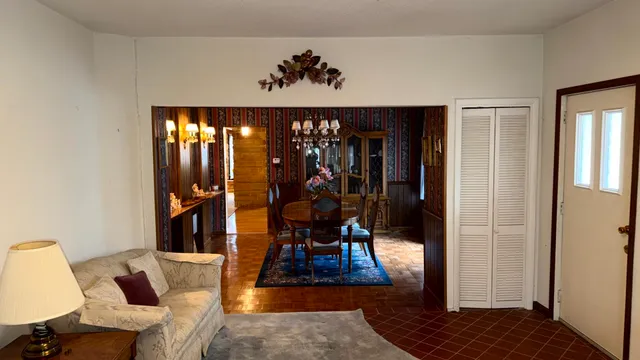 a room with gym equipment and a flat screen tv