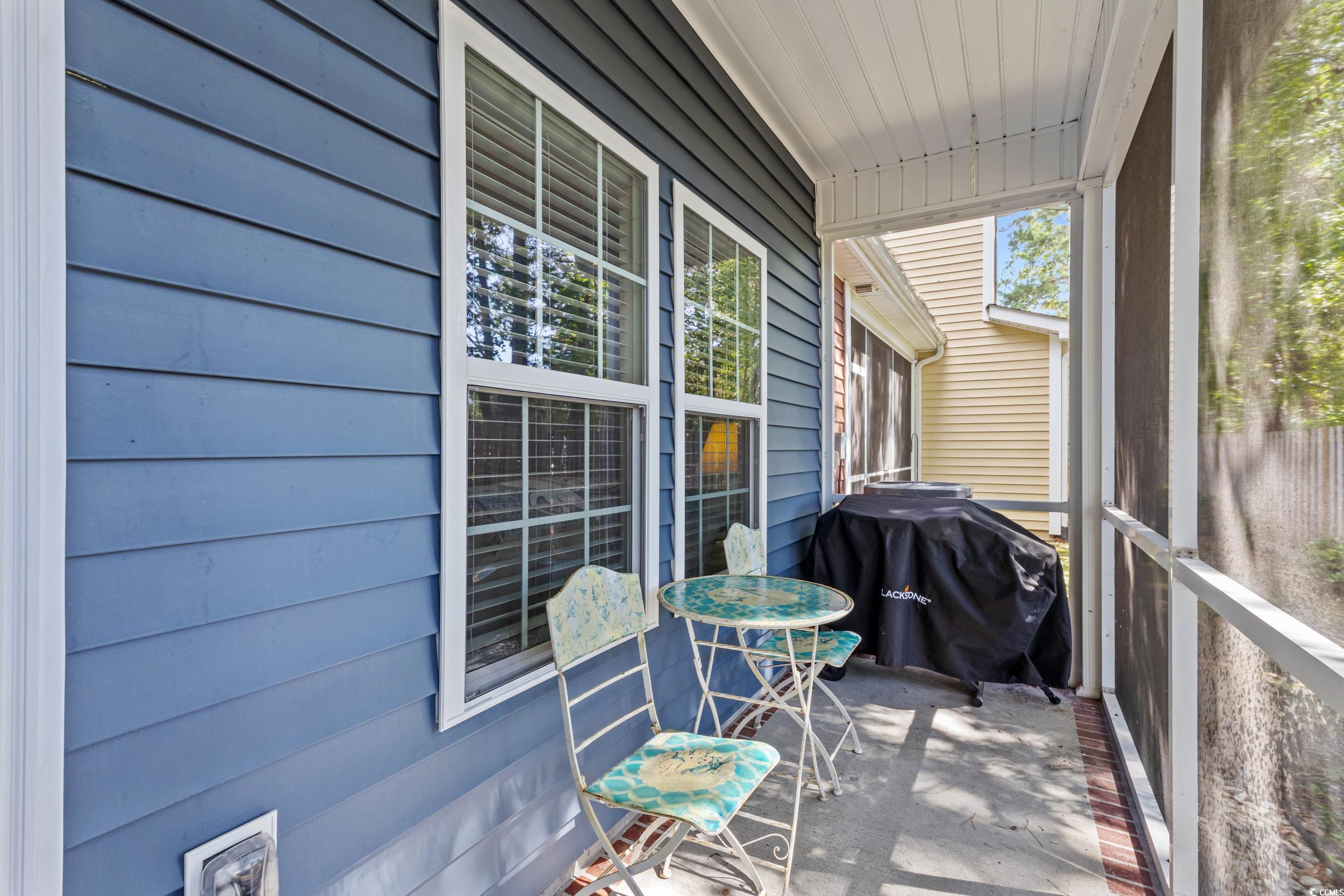 1745 Low Country Place, Unit D Columbia, SC 29209 - Photo 19 of 38 View of patio featuring a sunroom and area for grilling