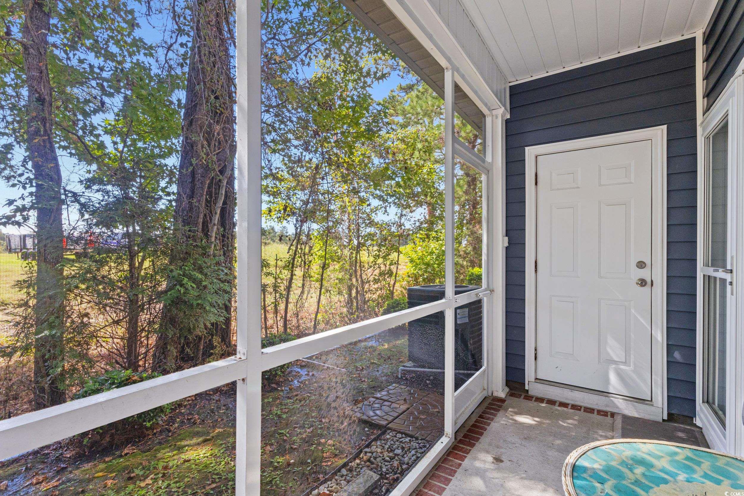 1745 Low Country Place, Unit D Columbia, SC 29209 - Photo 20 of 38 View of unfurnished sunroom