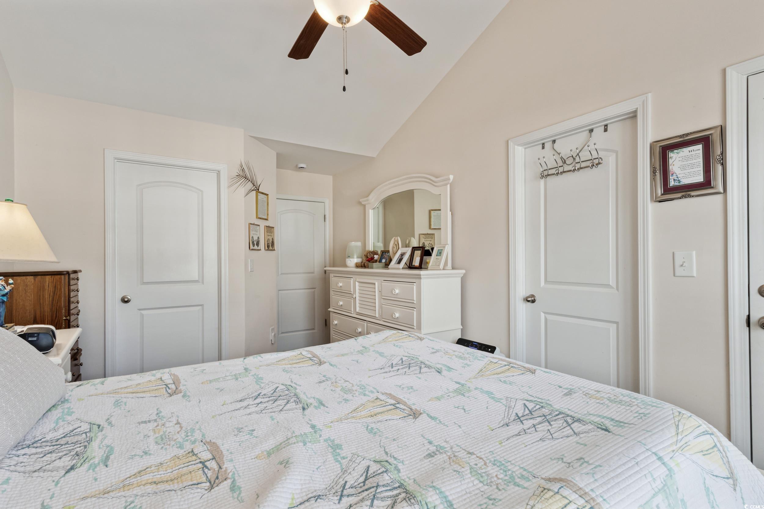 1745 Low Country Place, Unit D Columbia, SC 29209 - Photo 26 of 38 Bedroom featuring lofted ceiling, dark wood-style floors, and ceiling fan