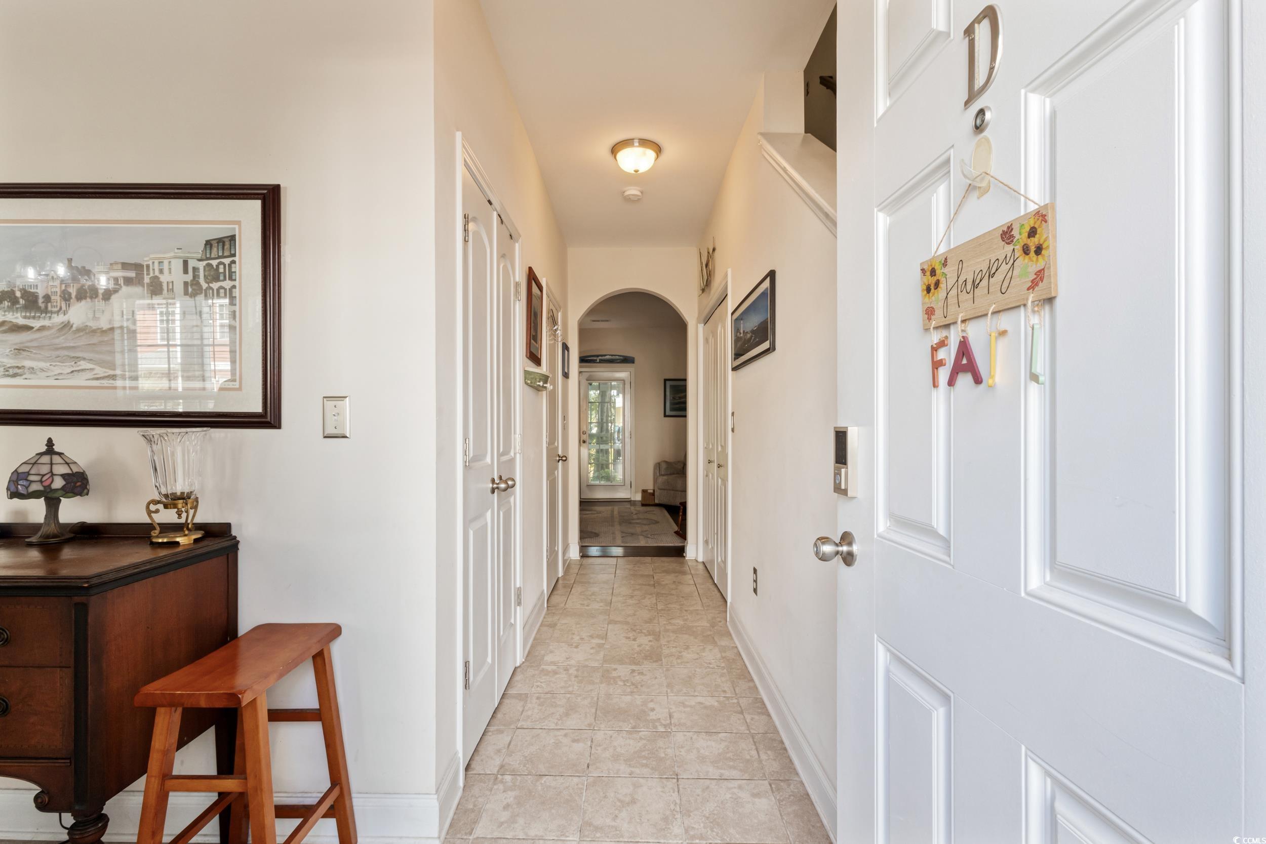 1745 Low Country Place, Unit D Columbia, SC 29209 - Photo 4 of 38 Hall with arched walkways and light tile patterned floors