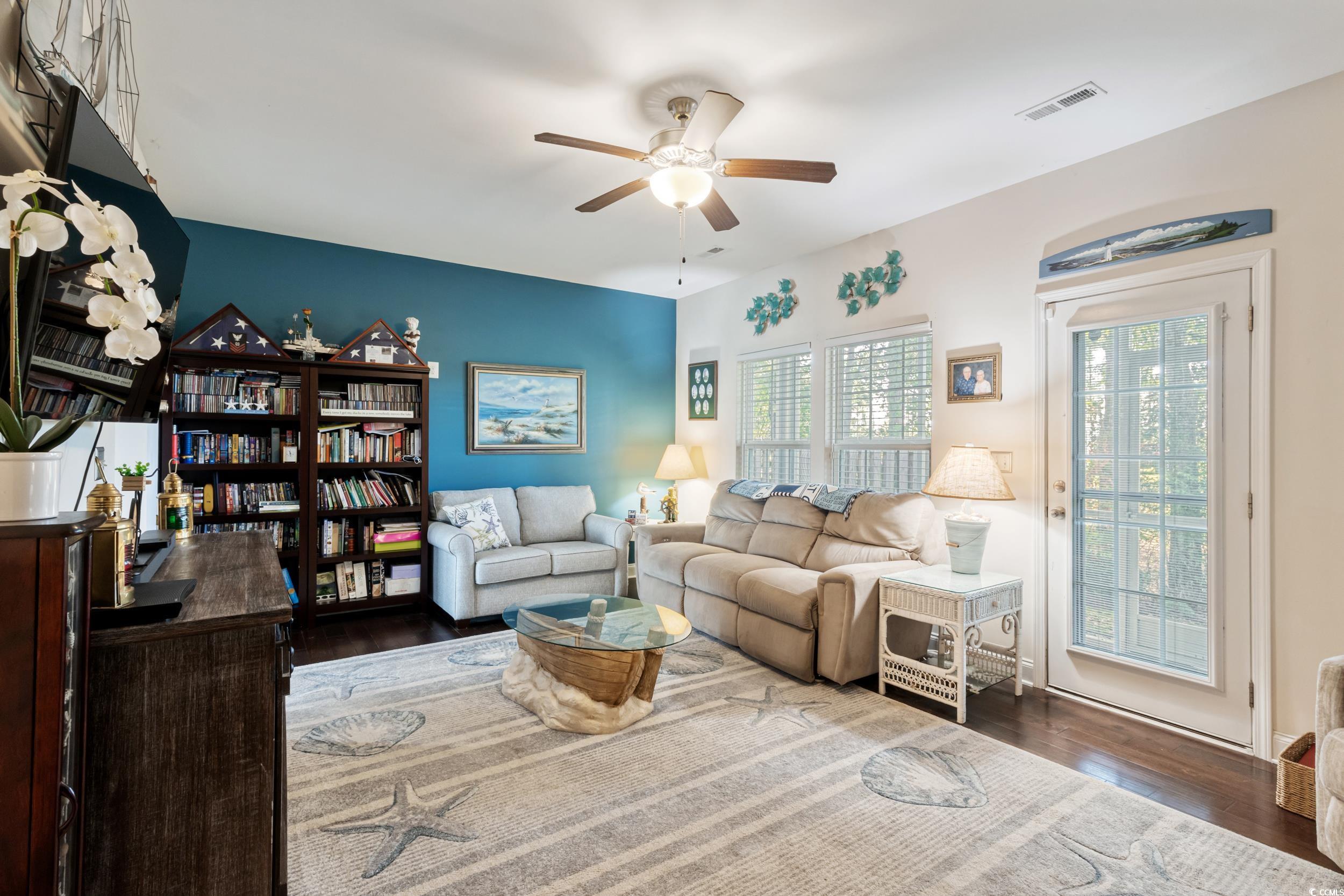 1745 Low Country Place, Unit D Columbia, SC 29209 - Photo 9 of 38 Living room with dark wood-type flooring and a ceiling fan