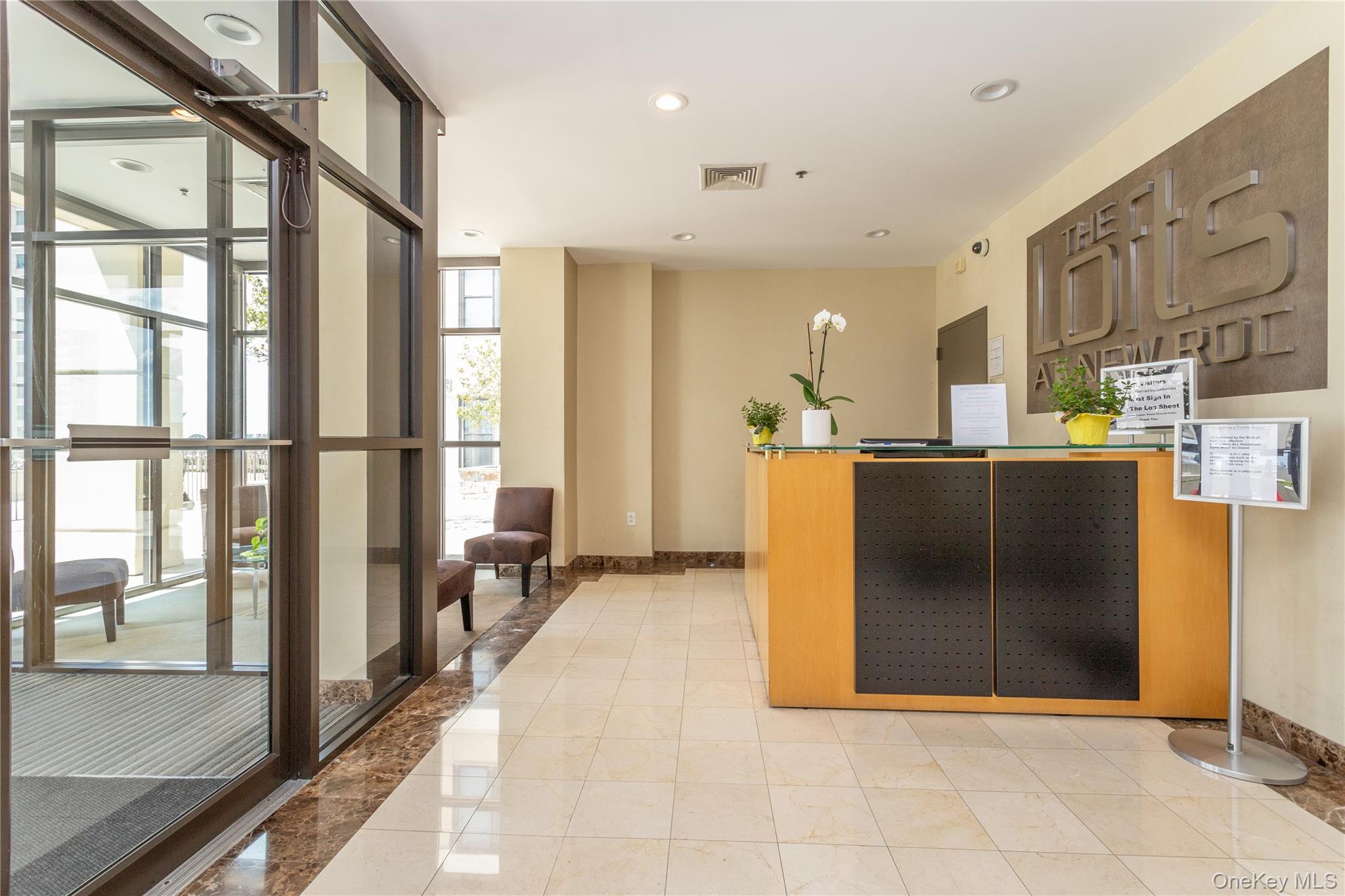 100 New Roc City Plaza, Unit 104 New Rochelle, NY 10801 - Photo 2 of 36 a view of a kitchen with stainless steel appliances granite countertop a refrigerator and a stove