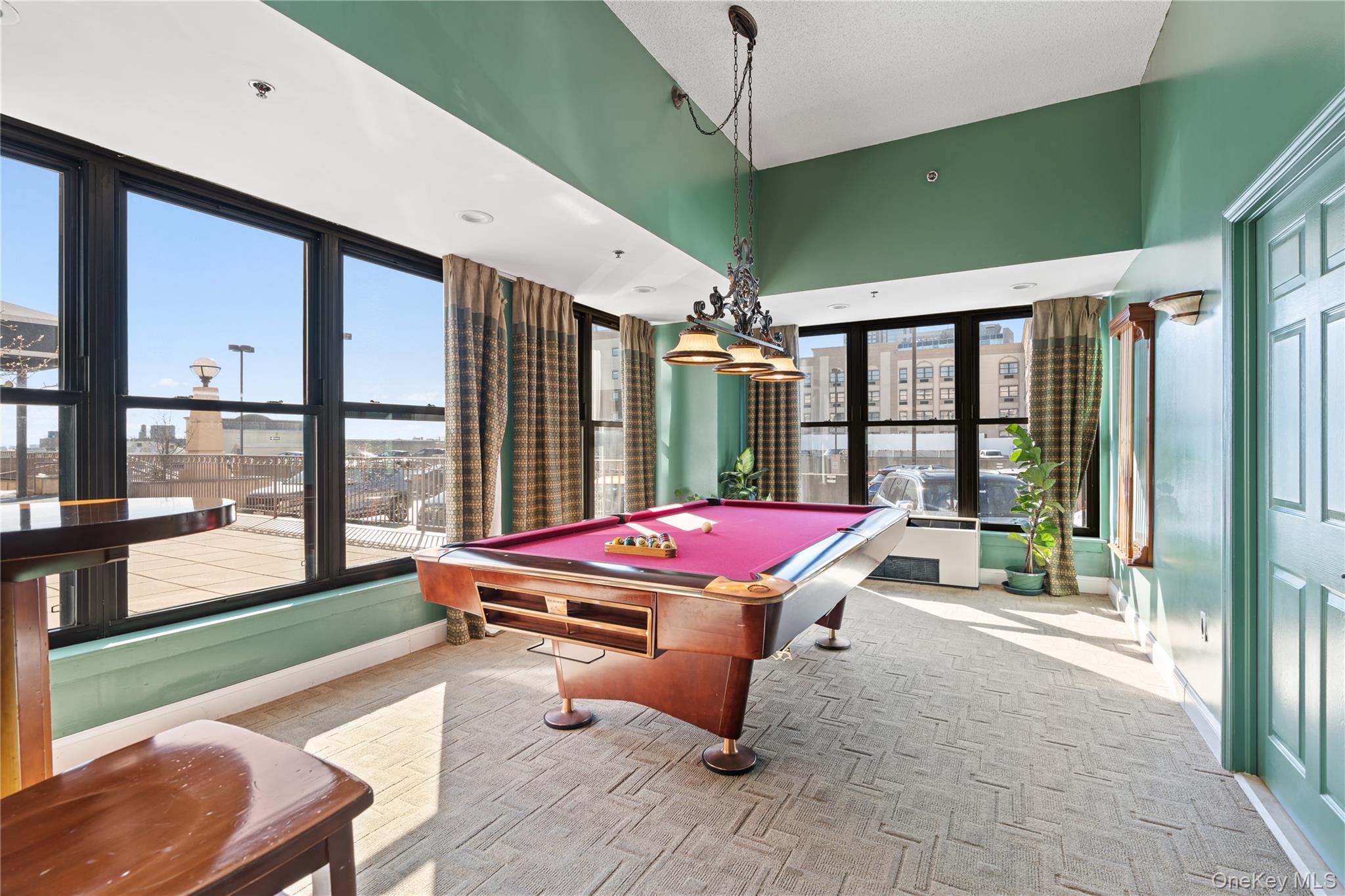 100 New Roc City Plaza, Unit 104 New Rochelle, NY 10801 - Photo 27 of 36 a patio with patio area view and a backyard