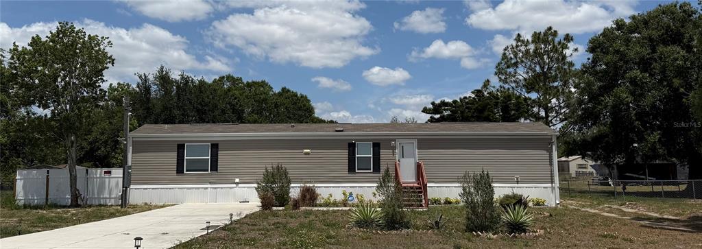 front view of house with a yard