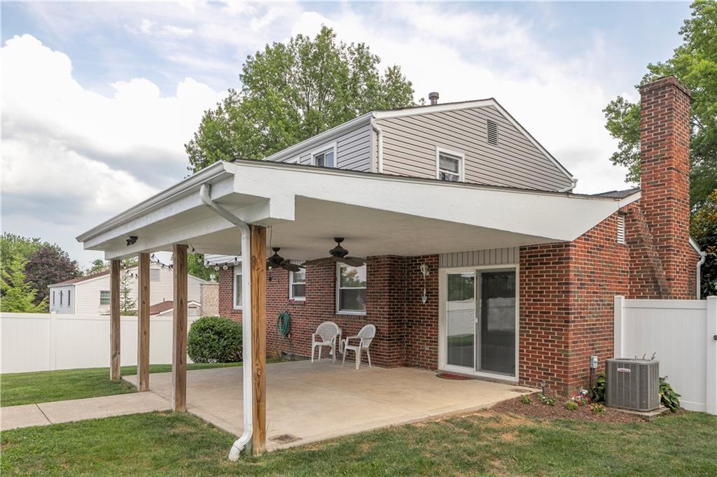 55 Dover Road Irwin, PA 15642 - Photo 21 of 25 Relaxing back porch with newer covered roof with 2 ceiling fans.