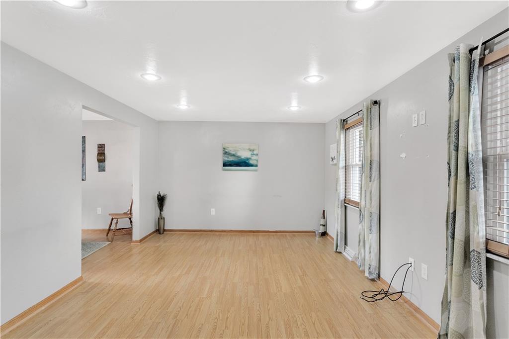 55 Dover Road Irwin, PA 15642 - Photo 4 of 25 The living room is bright and spacious with recessed lighting.