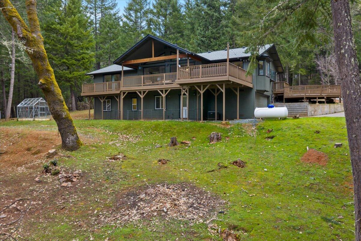 350 Splendor Drive Wilderville, OR 97543 - Photo 48 of 57 a front view of a house with garden