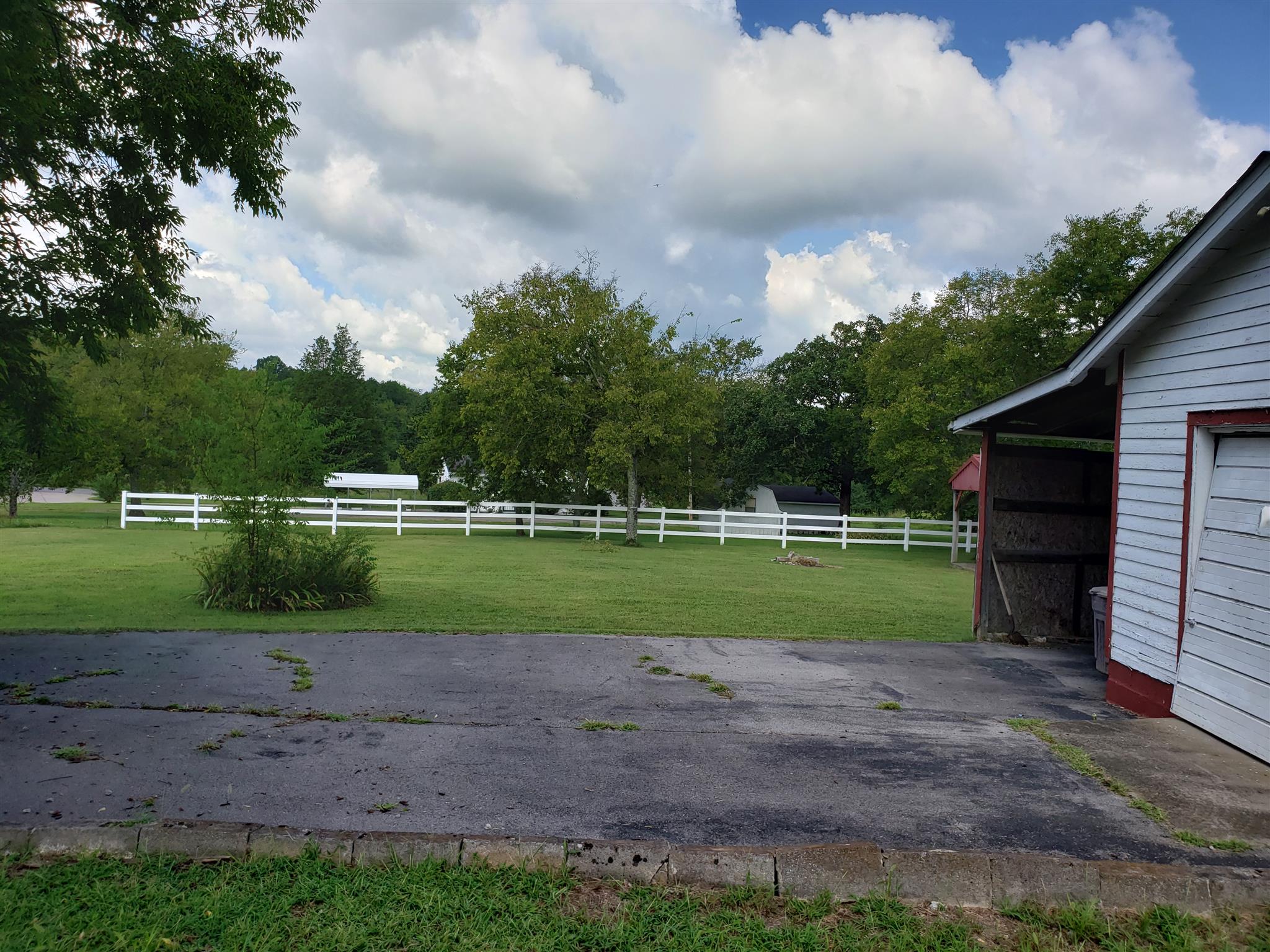 3122 Hunters Point Pike Lebanon, TN 37087 - Photo 3 of 28 back yard and carport garage
