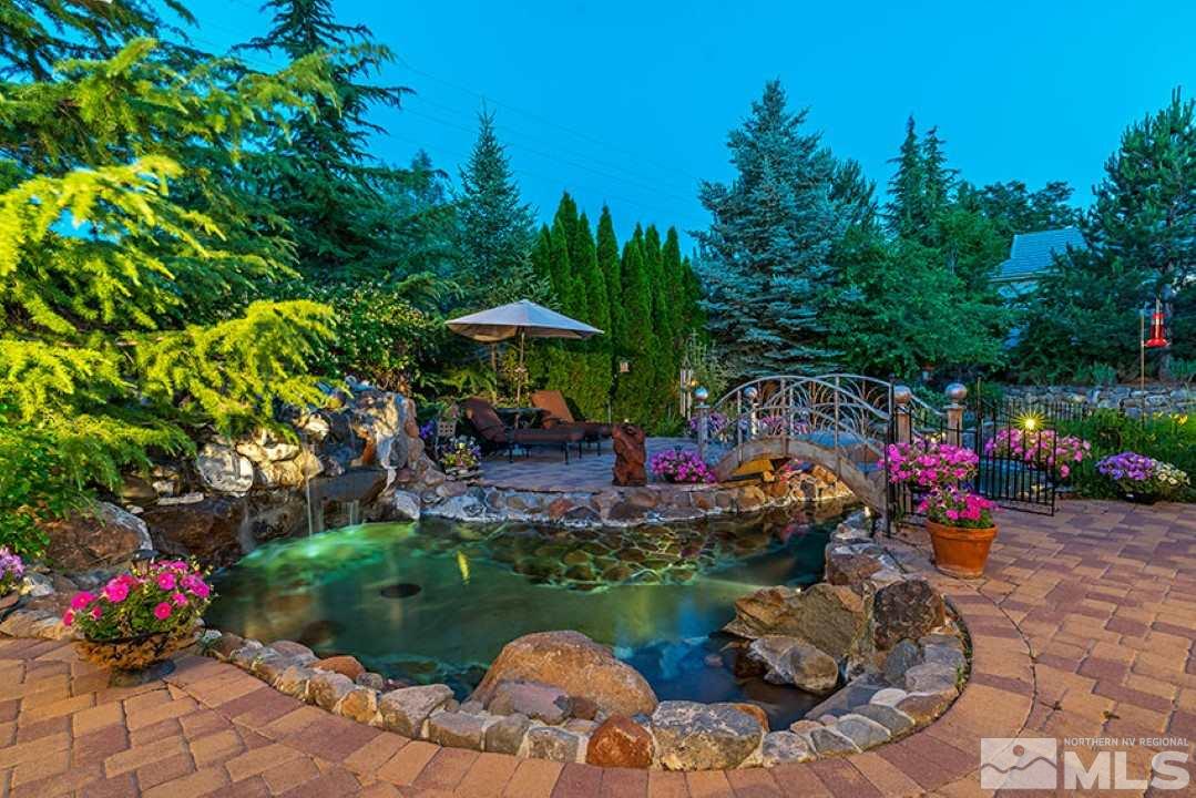 12760 Silver Wolf Road Reno, NV 89511 - Photo 20 of 25 a view of a table and chairs in patio