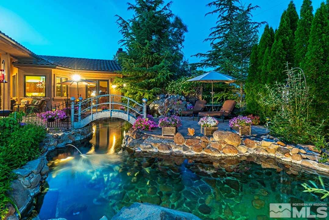 12760 Silver Wolf Road Reno, NV 89511 - Photo 21 of 25 a view of a backyard with plants and a patio