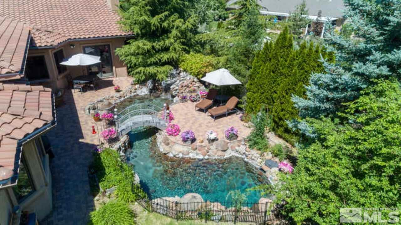 12760 Silver Wolf Road Reno, NV 89511 - Photo 24 of 25 an aerial view of a house with a yard and garden