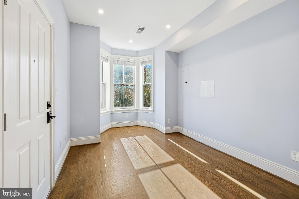 416 A Street Southeast, Unit 1 Washington, DC 20003 - Photo 5 of 30 a view of wooden floor in an empty room