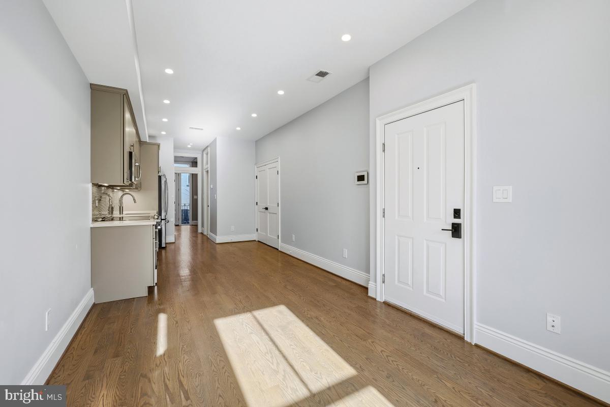 416 A Street Southeast, Unit 1 Washington, DC 20003 - Photo 8 of 30 a view of entryway with wooden floor