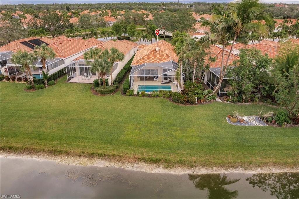 4696 Rio Poco Court Naples, FL 34109 - Photo 4 of 49 Huge yard behind screen enclosure.
