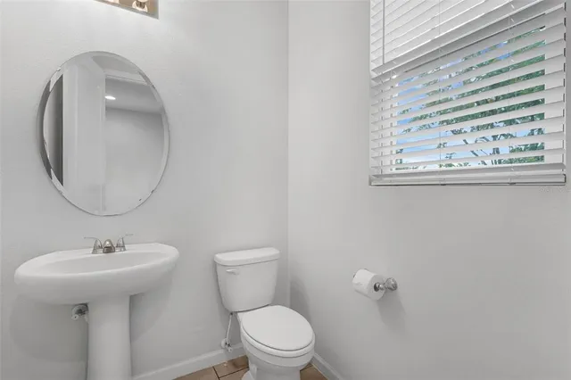 a view of a lake with houses in the back