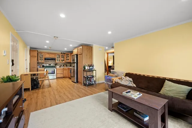 a living room with furniture and a table