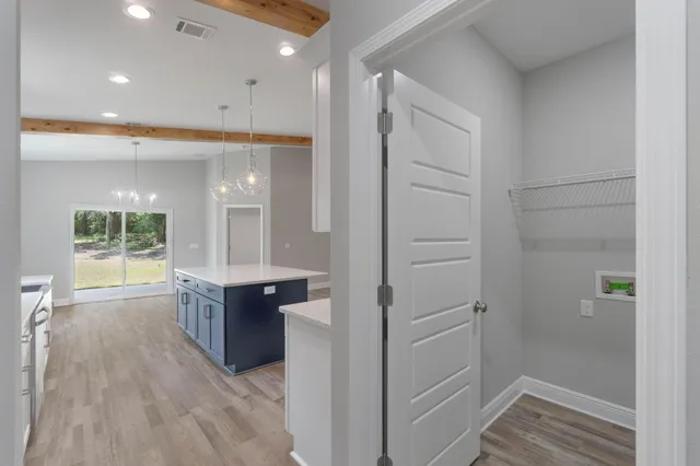 wooden floor and windows in a room