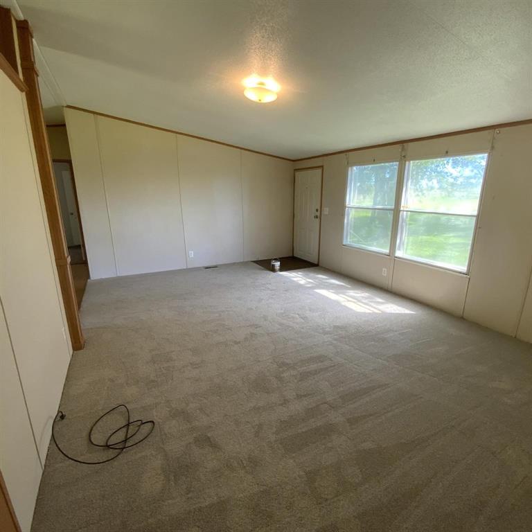929 Neighbors Corner Road Mart, TX 76664 - Photo 5 of 28 an empty room with windows
