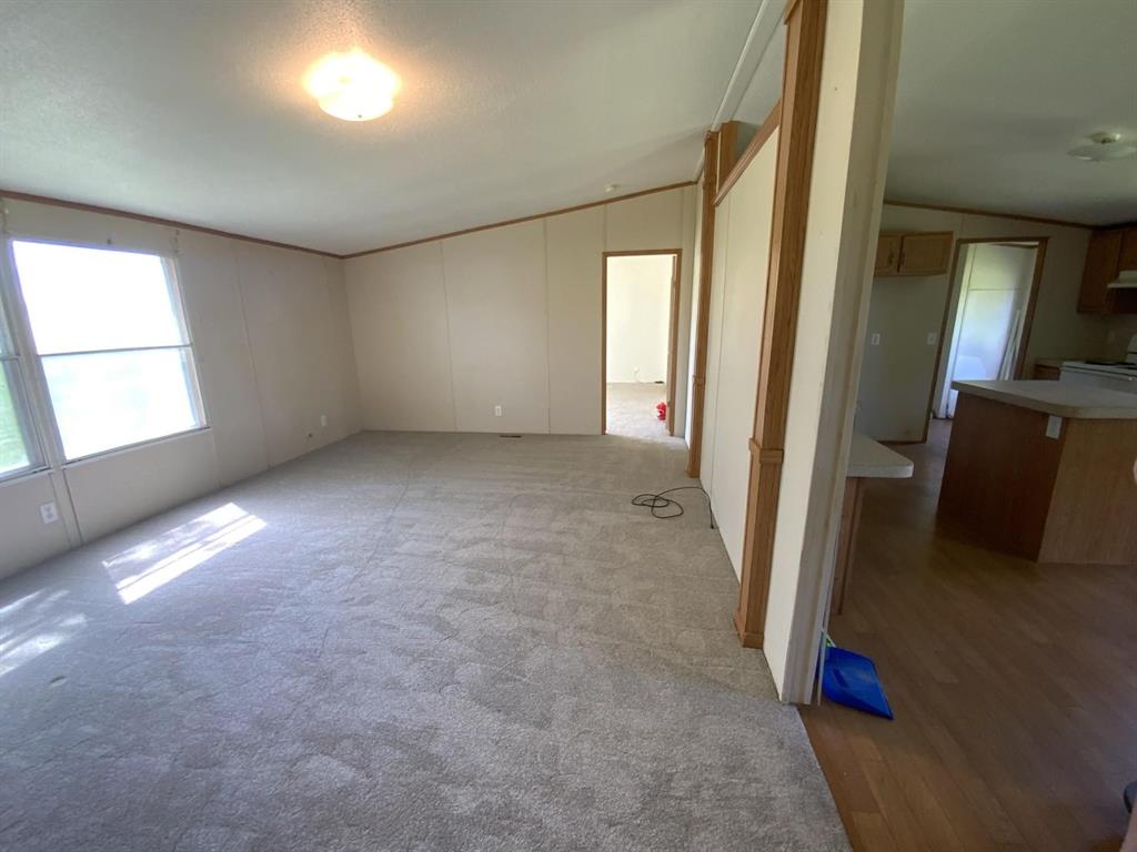 929 Neighbors Corner Road Mart, TX 76664 - Photo 6 of 28 an empty room with windows