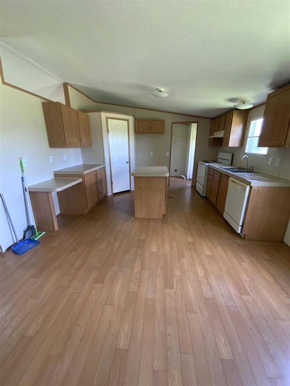 929 Neighbors Corner Road Mart, TX 76664 - Photo 9 of 28 a living room with furniture and a wooden floor