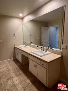 a view of an empty room with a sliding door