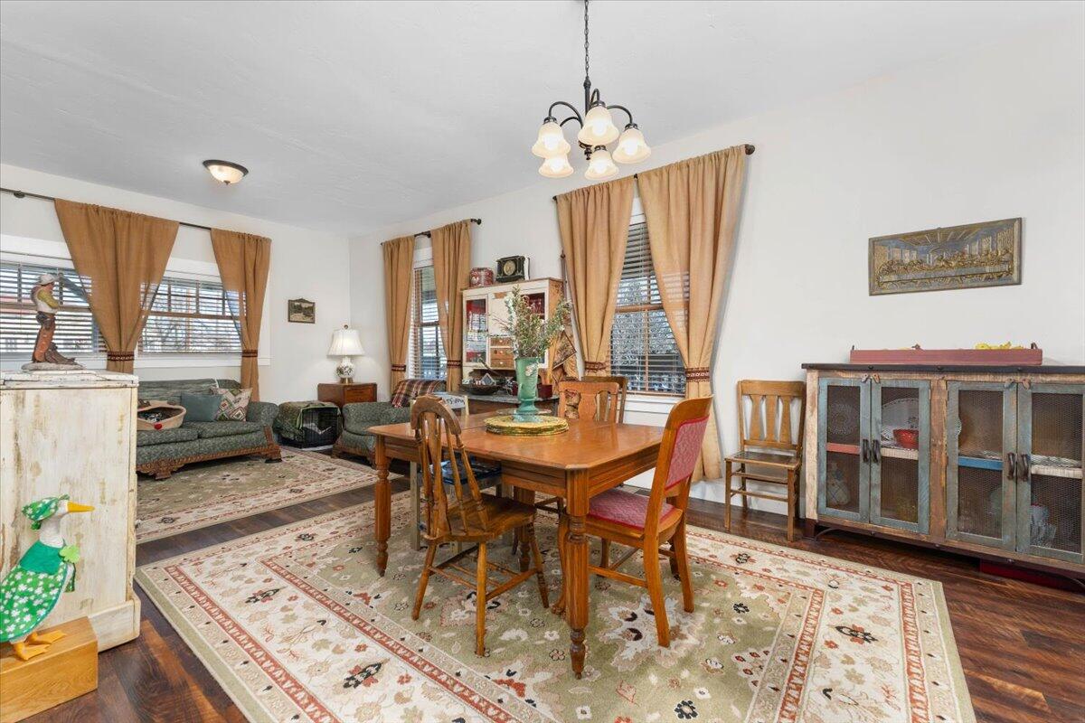 24894 Long Street Fall River Mills, CA 96028 - Photo 15 of 43 a view of a dining room with furniture window and wooden floor