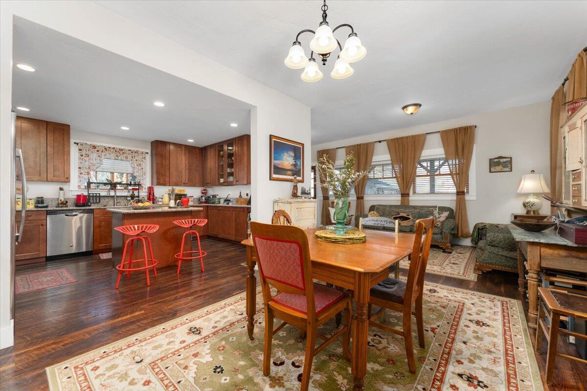 24894 Long Street Fall River Mills, CA 96028 - Photo 16 of 43 a view of a dining room with furniture window and wooden floor
