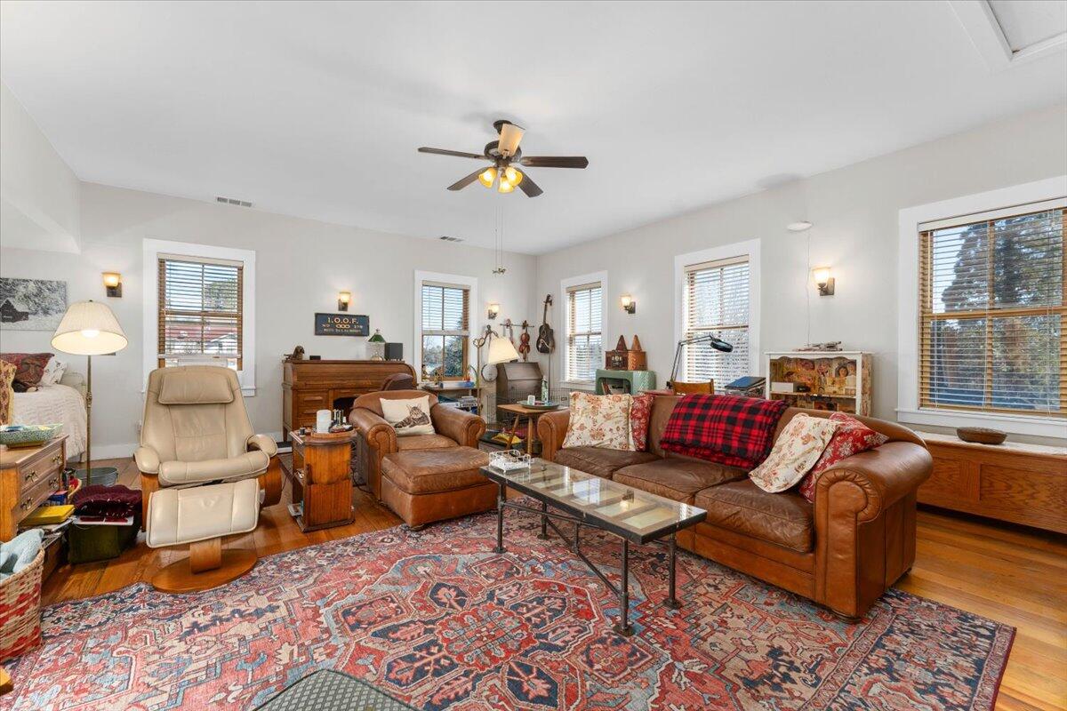 24894 Long Street Fall River Mills, CA 96028 - Photo 10 of 43 a living room with furniture a rug and a window